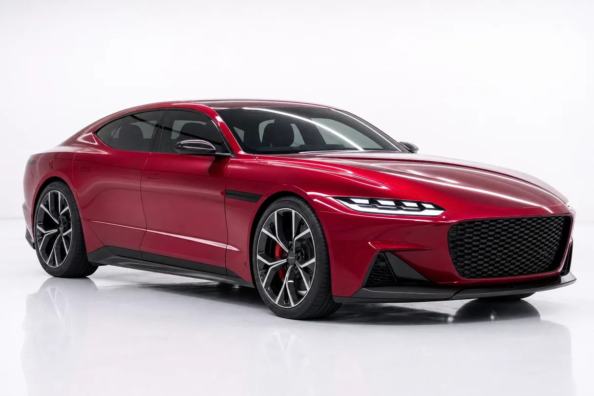 A four-door sports saloon in a candy gloss Bloodline Red wrap